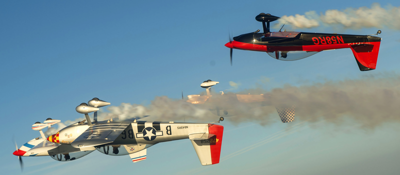 Two planes flying upside down